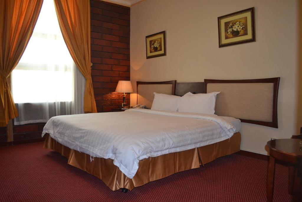 Bilqase Throne Hotel Дамам Стая снимка